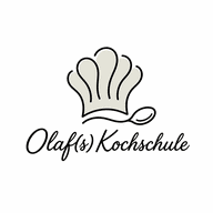 Frischer Kochkurs in Olaf's Kochschule mit professionellen Küchenchefs.